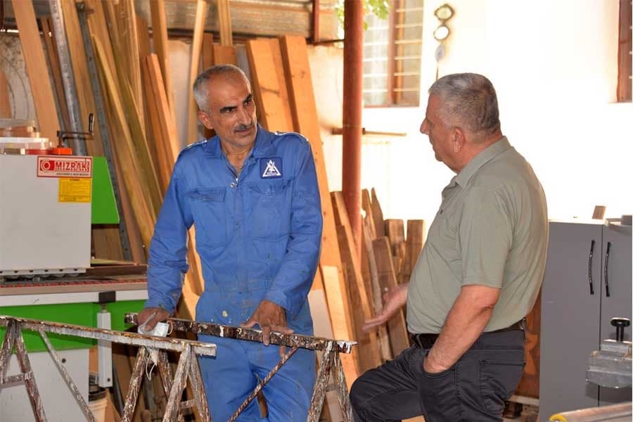 Estaifan at work in his carpentry shop in Karamles