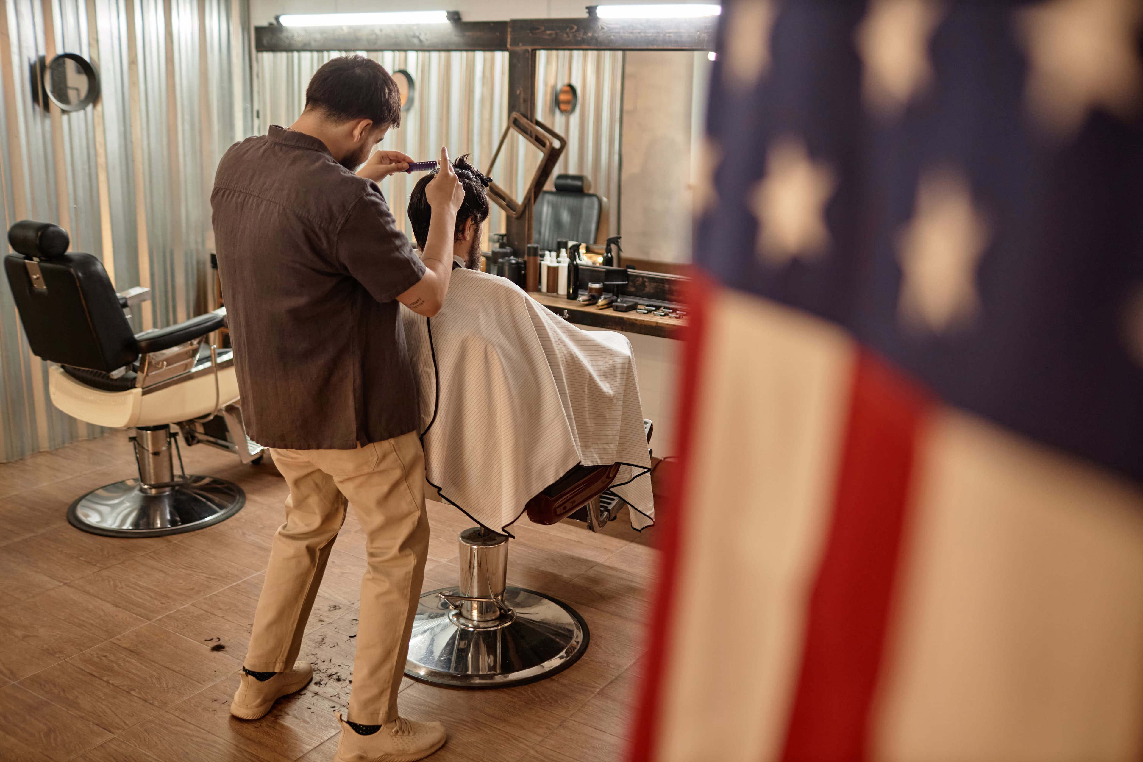 A barber at work in his shop